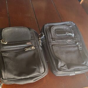 2 Tumi men’s bag